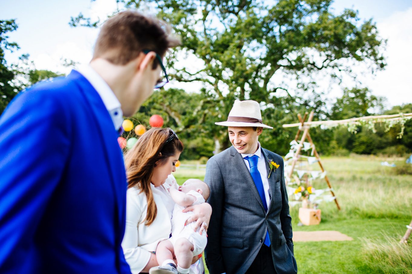 groom waiting and smiling