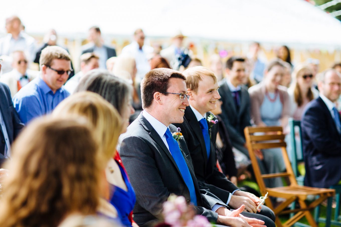 best man watching the wedding ceremony