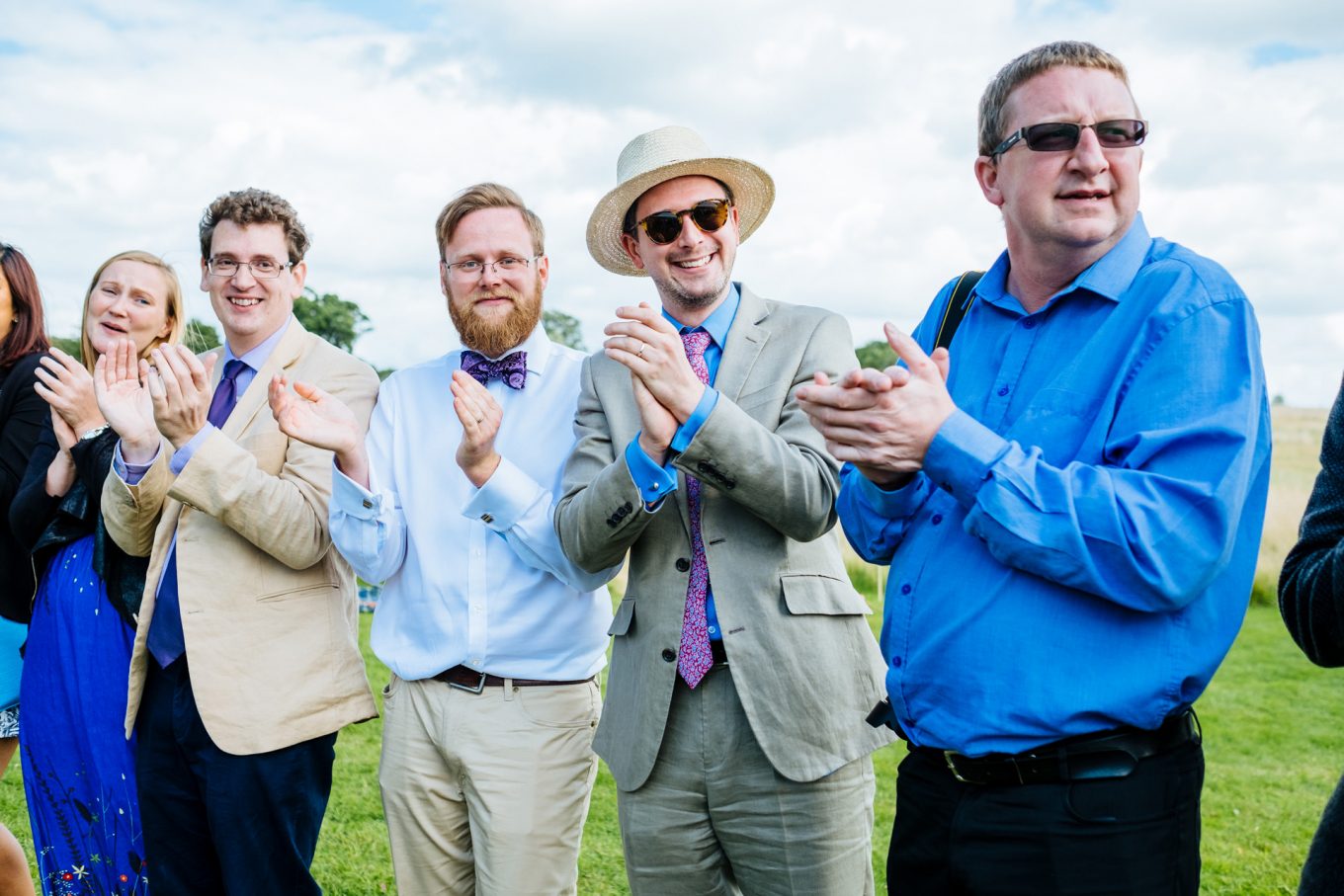 wedding guests clapping