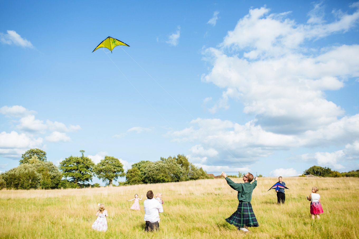 flying a kite at a wedding
