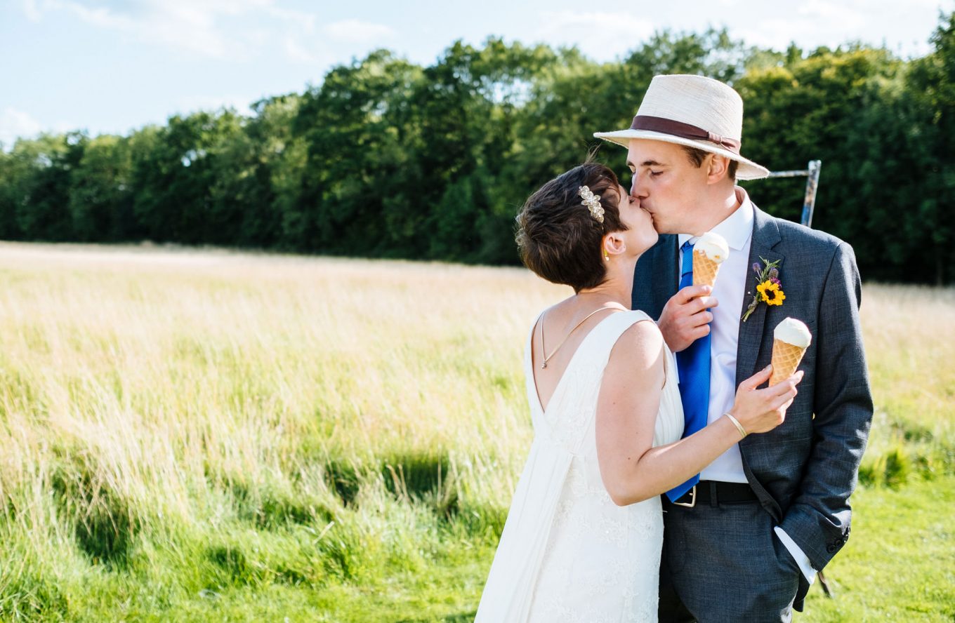 bride and groom having ice cream