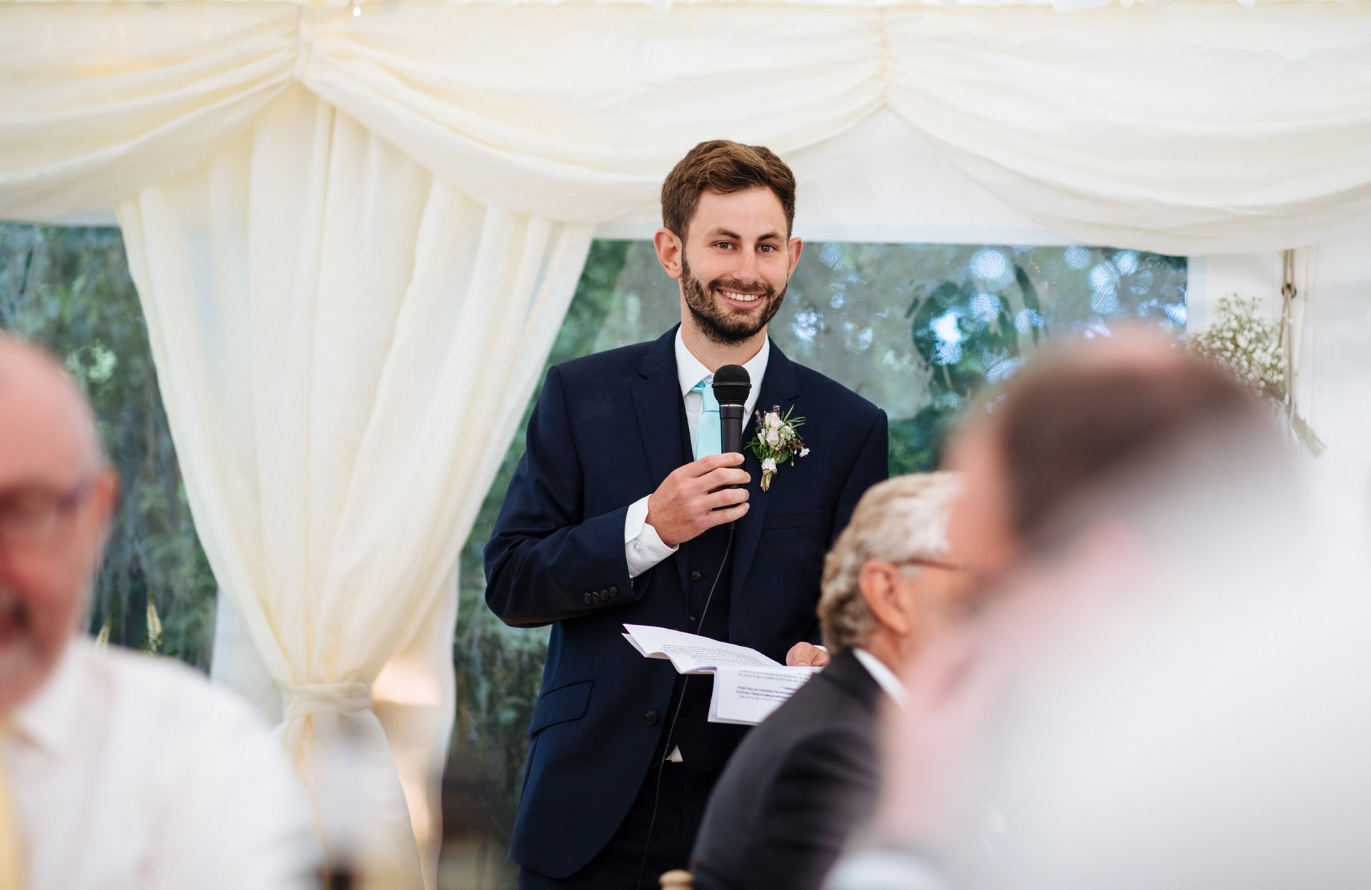 groom giving speech at oxfordshire marquee wedding