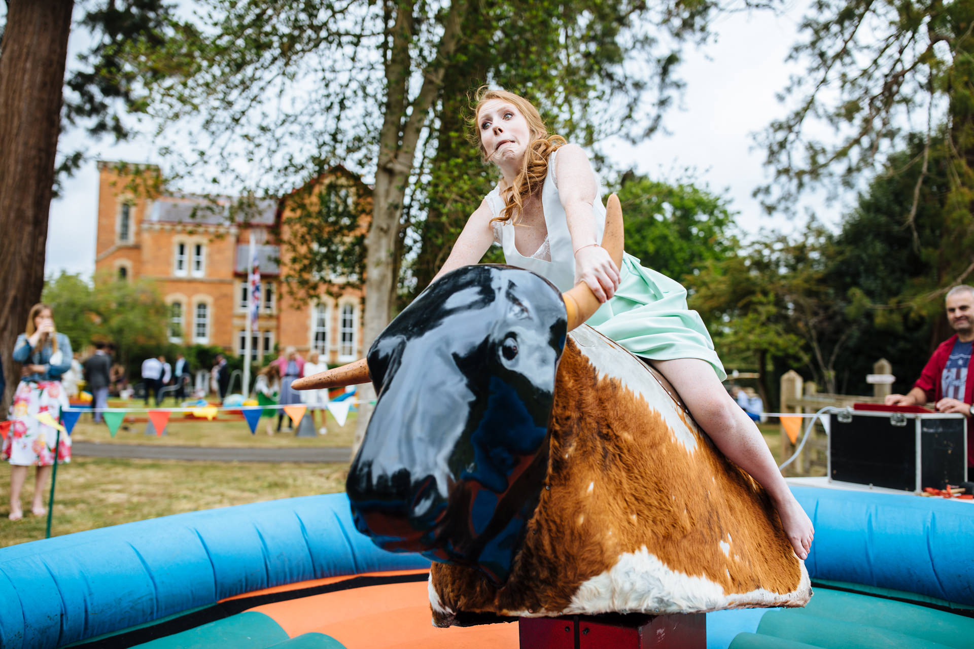 bridesmaids on bucking broncho at wedding