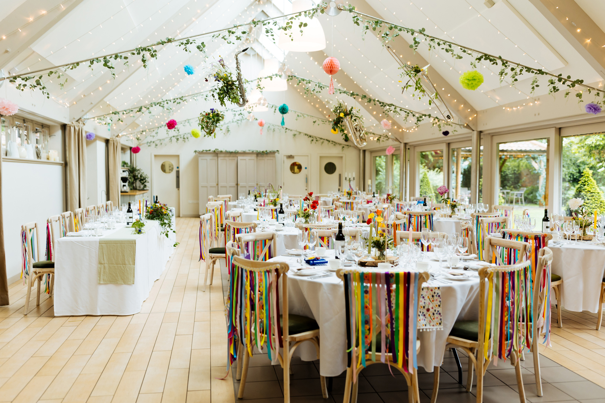 A beautiful wedding with musical instruments on the ceiling!