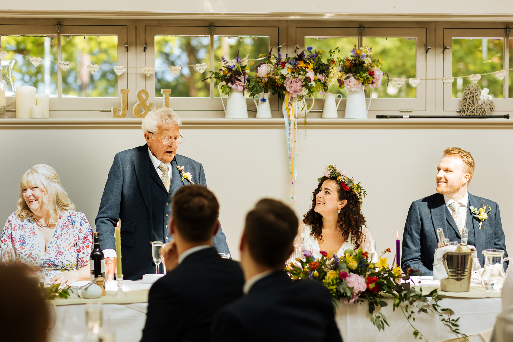 A beautiful wedding with musical instruments on the ceiling!