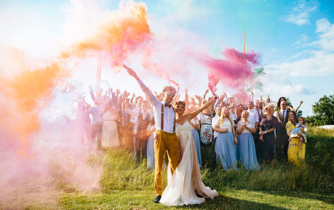 festival wedding ideas colourful smoke bombs